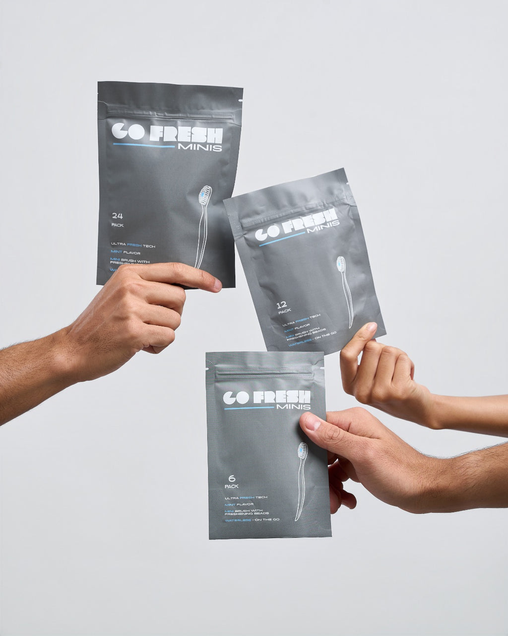 Go Fresh Minis 6, 12 and 24 packs held in hands