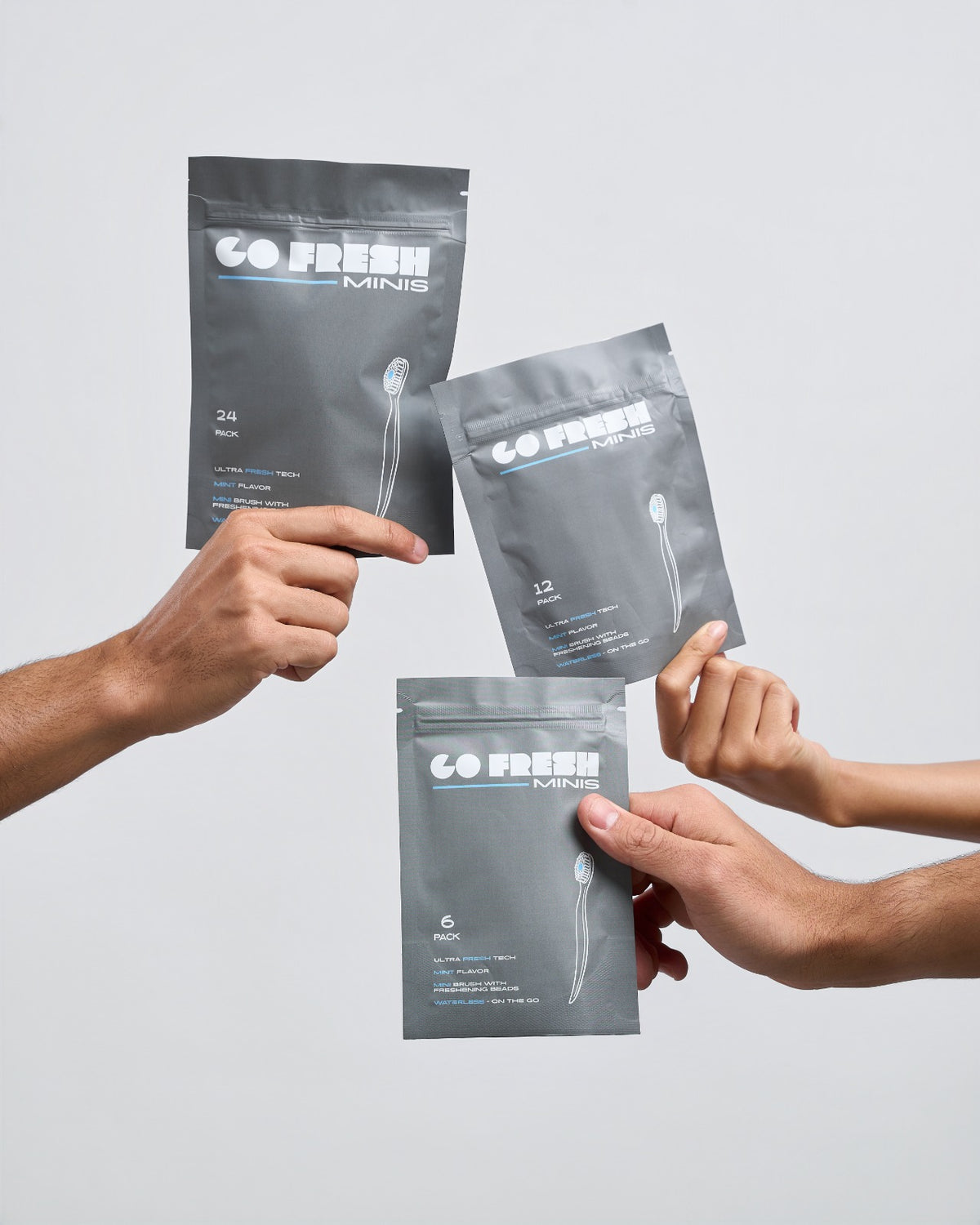 Go Fresh Minis 6, 12 and 24 packs held in hands